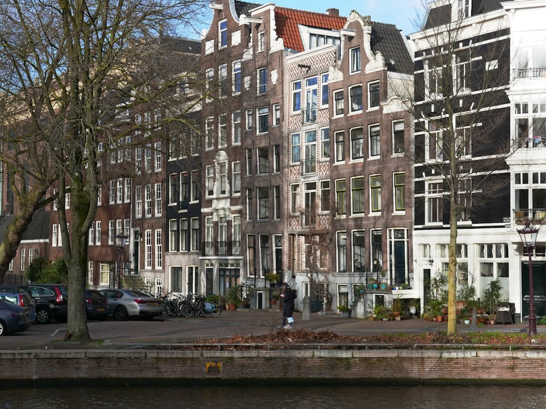 Leveraging Multimodal LLMs for Built Environment and Housing Attribute Assessment from Street-View Imagery
